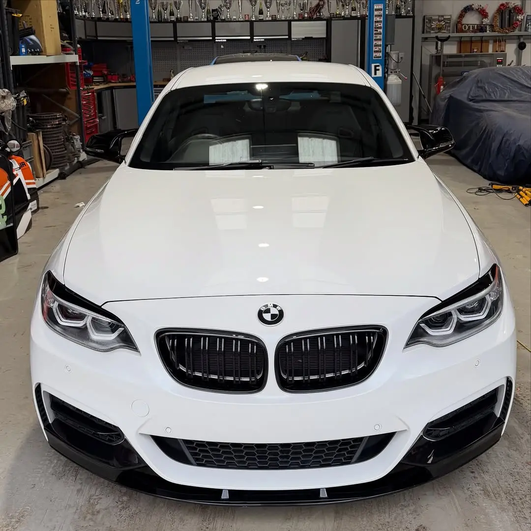 White BMW M240i ceramic coated by Tucked Valets
