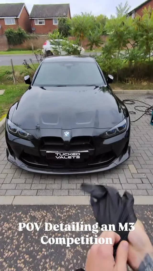 BMW M3 Competition on its weekly maintenance clean